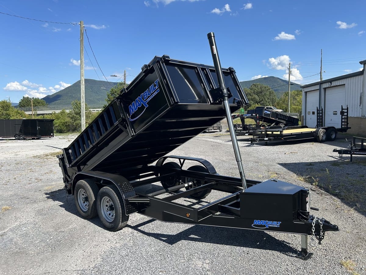 Telescopic dump trailer raised, rear three-quarter view