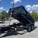 Max Built telescopic dump trailer with the bed raised